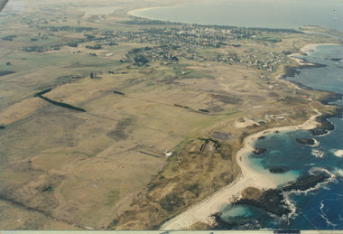 Aerial view over the West of Port Fairy with the Sandhill cemetery in the middle ground