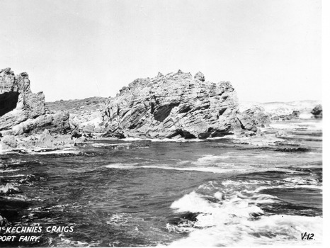Rocky outcrops with small waves lapping around them