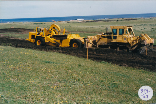 Earth moving equipment cutting a road through South Beach Estate