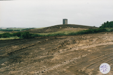Earthworks in foreground with Port Fairy Water tower in background