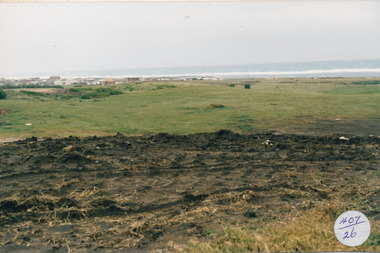Earthworks on hill with south beach estate in distance