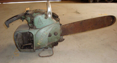 Chainsaw, Maker's name "Outboard Marine Australia Pty. Ltd