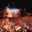 Melbourne city skyline at night with Myer Music Bowl and crowds