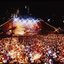 Melbourne city skyline at night with Myer Music Bowl and crowds