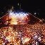 Melbourne city skyline at night with Myer Music Bowl and crowds