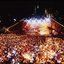 Melbourne city skyline at night with Myer Music Bowl and crowds