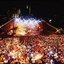 Melbourne city skyline at night with Myer Music Bowl and crowds