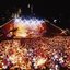 Melbourne city skyline at night with Myer Music Bowl and crowds