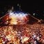 Melbourne city skyline at night with Myer Music Bowl and crowds