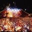 Melbourne city skyline at night with Myer Music Bowl and crowds