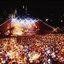 Melbourne city skyline at night with Myer Music Bowl and crowds