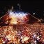 Melbourne city skyline at night with Myer Music Bowl and crowds