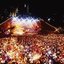 Melbourne city skyline at night with Myer Music Bowl and crowds