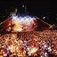 Melbourne city skyline at night with Myer Music Bowl and crowds