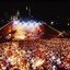 Melbourne city skyline at night with Myer Music Bowl and crowds