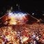 Melbourne city skyline at night with Myer Music Bowl and crowds