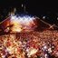Melbourne city skyline at night with Myer Music Bowl and crowds