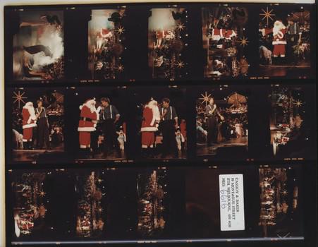 Cameron Daddo and Santa on Carols by Candlelight stage