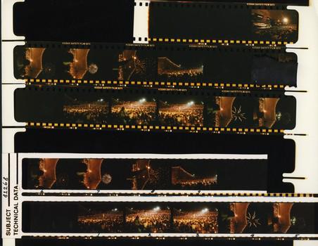 Printed negatives of images taken of performers and the audience