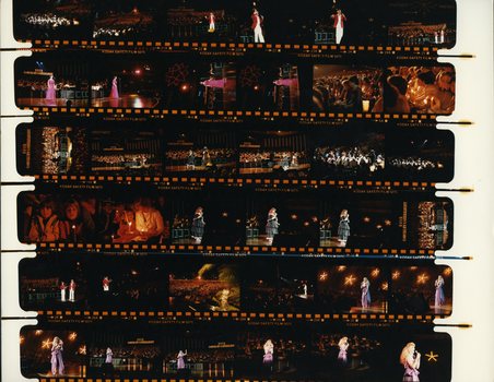 Printed negatives of images taken of performers and the audience