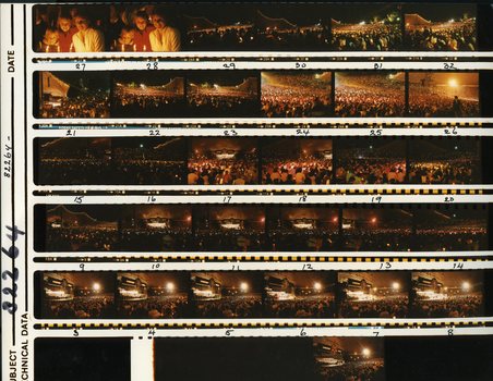 Printed negatives of images taken of performers and the audience