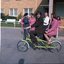 Murray Mountain and female dressed in pink riding a tandem bike