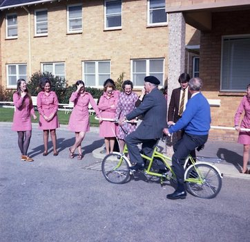 Hubert Opperman and Arthur Wilkins riding a tandem bicycle