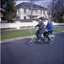 Hubert Opperman and Arthur Wilkins riding a tandem bicycle
