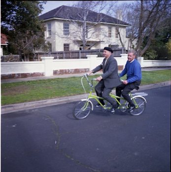 Hubert Opperman and Arthur Wilkins riding a tandem bicycle