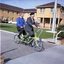 Hubert Opperman and Arthur Wilkins riding a tandem bicycle
