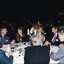 Group of guests chat at the table