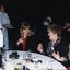 Women chat around the table, second from right is Margaret Bull, Director of Children's Services