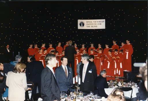 National Boys Choir singing as guests mill around