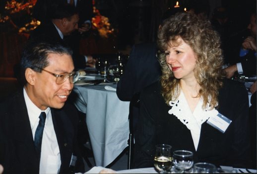 Man and woman seated at a table