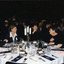 Five women around a table at the luncheon, with Janet Cronin second from the right