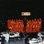 National Boys Choir dressed in red, with their conductor, in front of a starry backdrop with RVIB above them