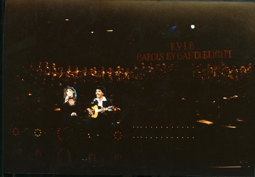 Bram and Dianne Manusama on stage at Carols