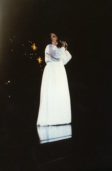 Stella Axarlis on stage at Carols