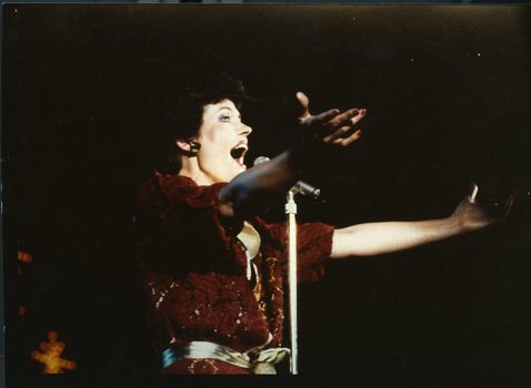 Julie Anthony on stage at Carols
