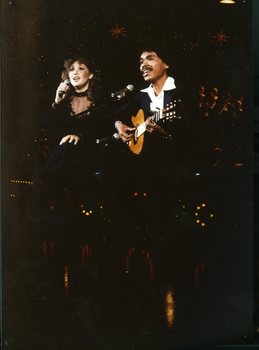 Bram and Dianne Manusama on stage at Carols