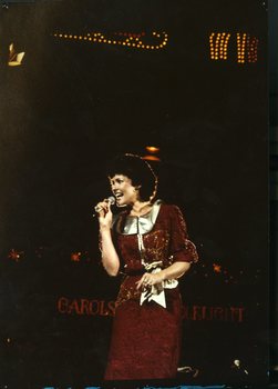 Julie Anthony on stage at Carols