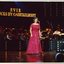Joan Carden singing on stage