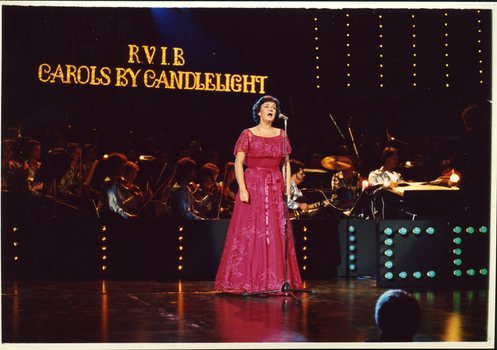 Joan Carden singing on stage