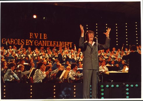 John Diedrich singing on stage