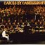 Simon Gallaher singing and playing piano on stage