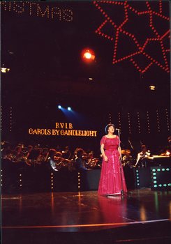 Joan Carden singing on stage
