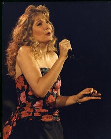 Alyce Platt sings to the crowds at Carols