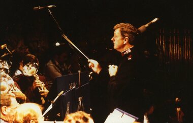 Colin Woods conducting the band