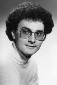 John  Atwell in cream turtle neck jumper