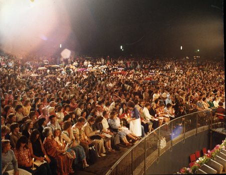 Audience in Sidney Myer Music Bowl, holding candles